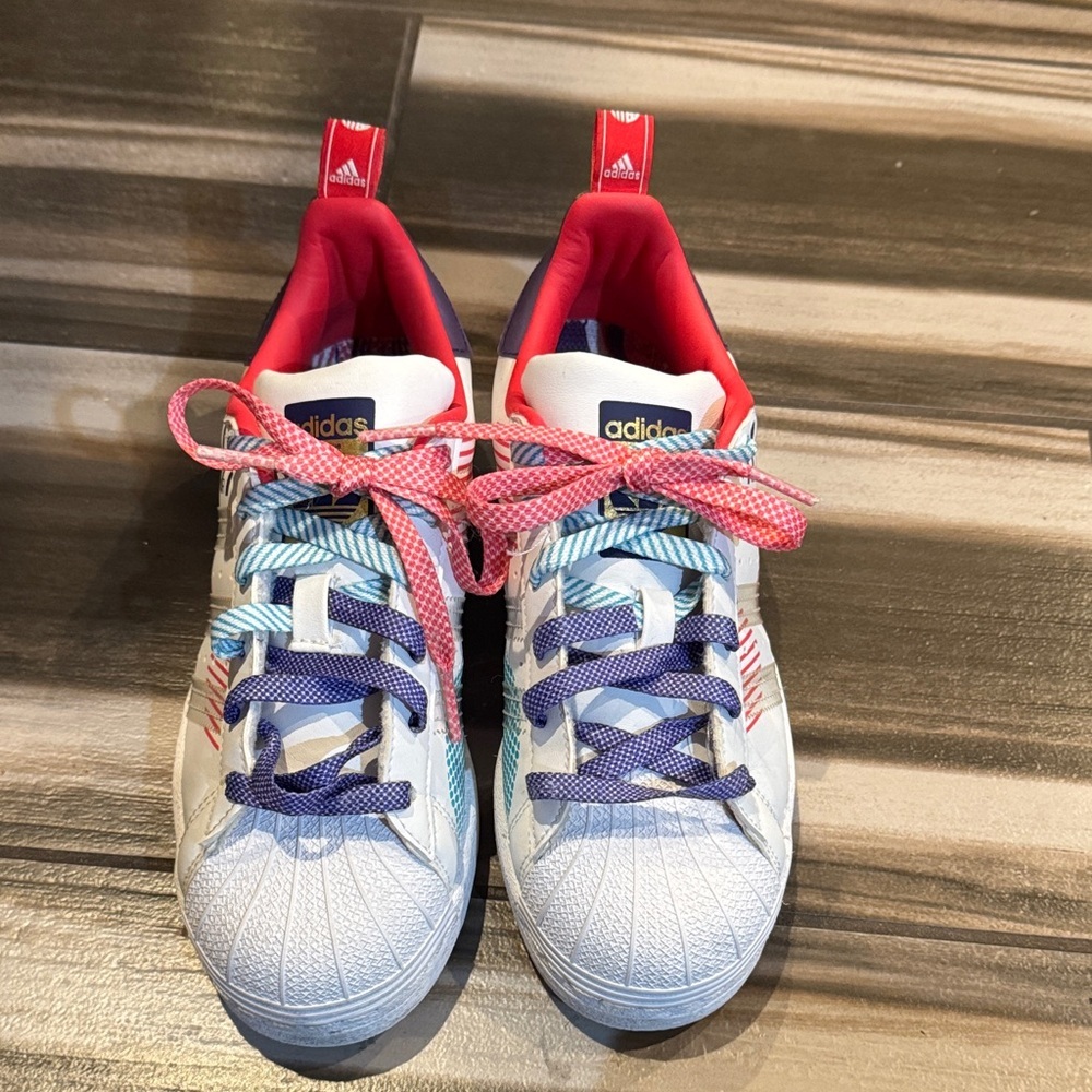 Adidas Kids' White and Pink Sneakers with Blue Accents